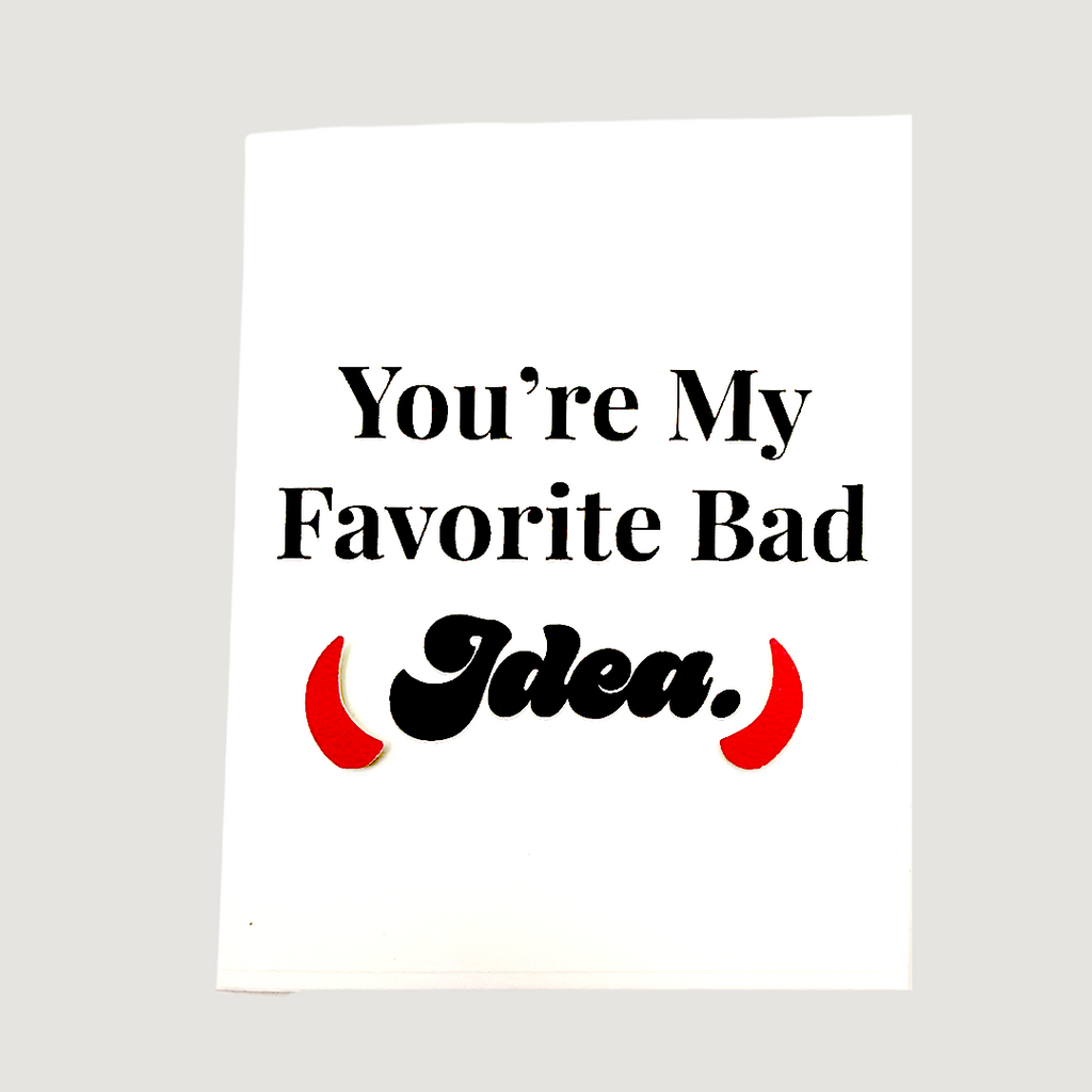 Front of card reading You're My Favorite Bad Idea with red devil horns accent